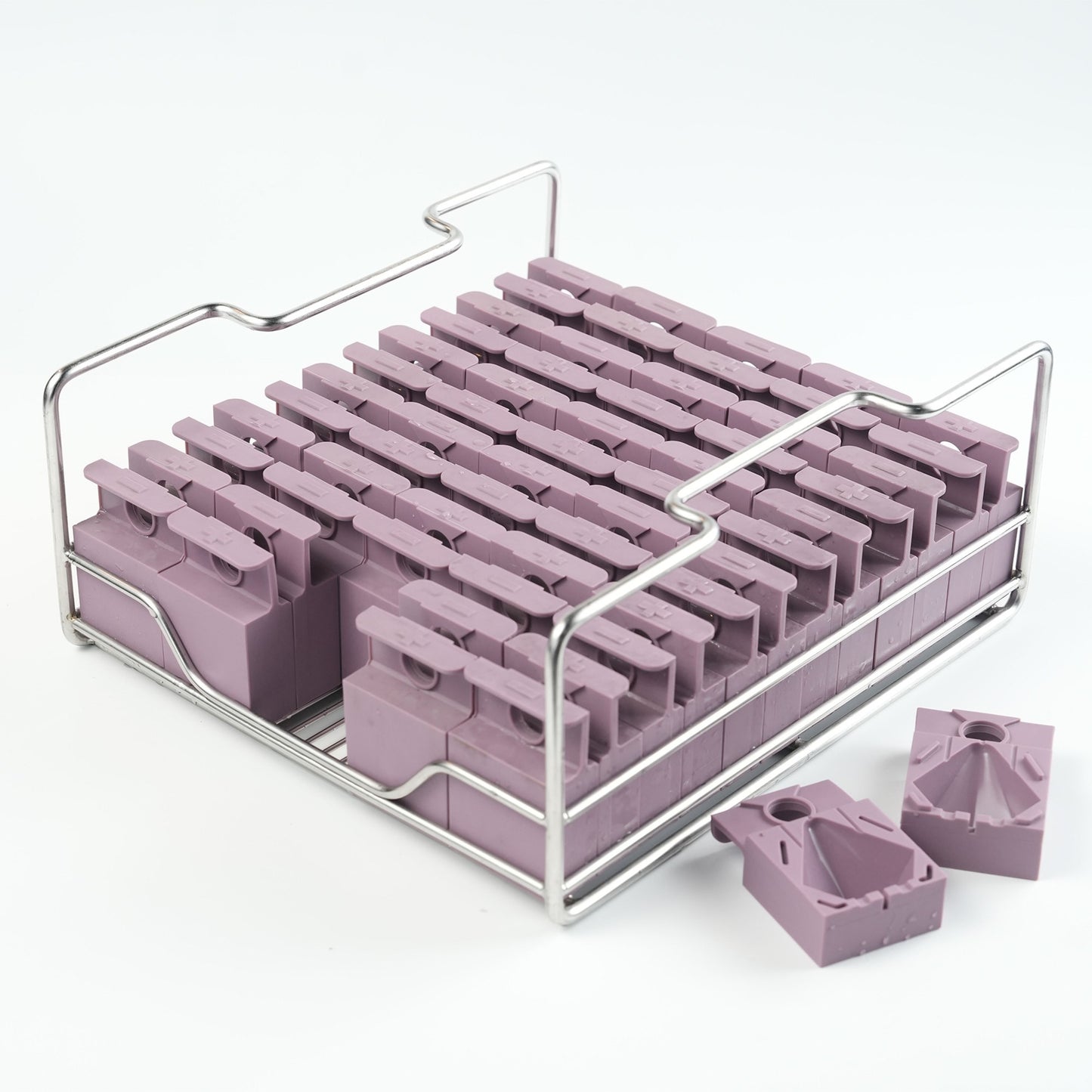 A tray of silicone molds to make diamond-shape clear ice blocks