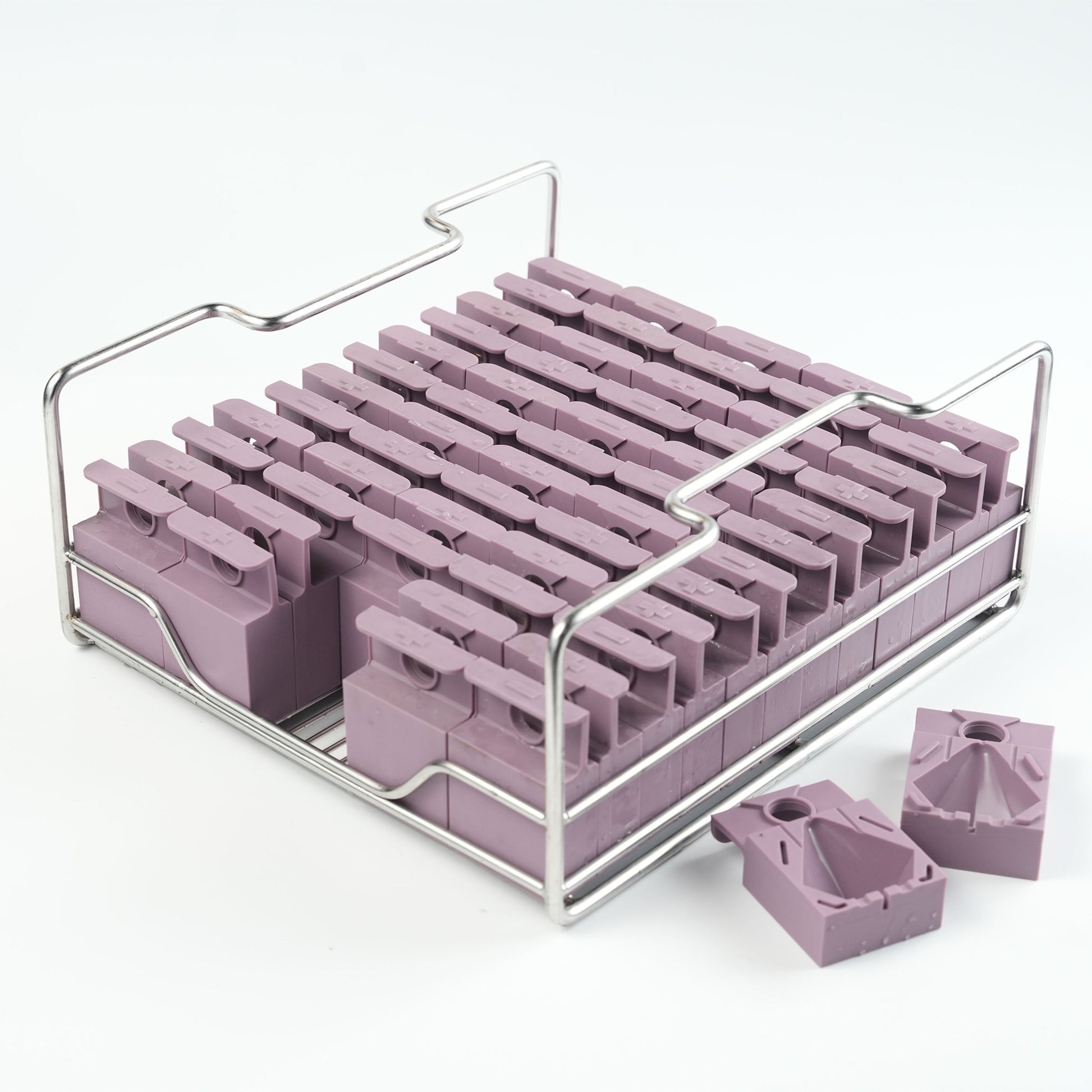 A tray of silicone molds to make diamond-shape clear ice blocks