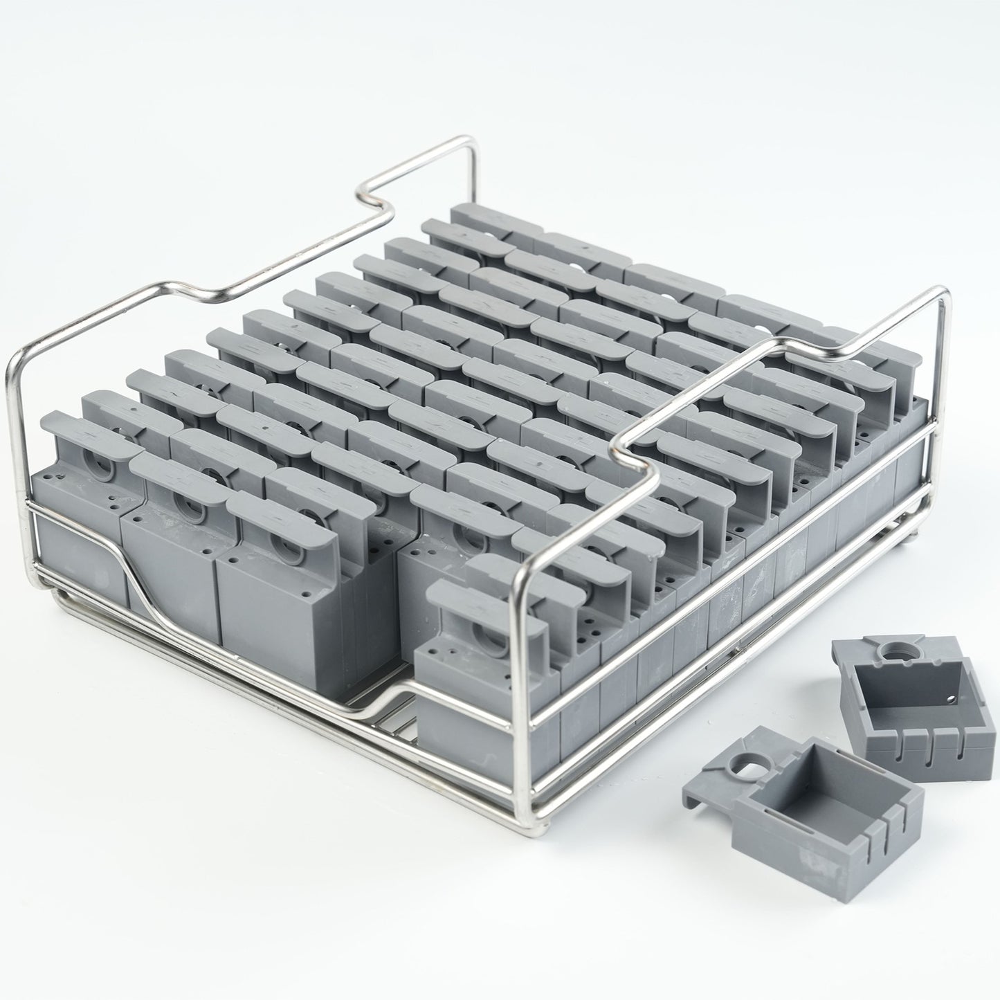 A tray of silicone molds to make cube-shape clear ice blocks.