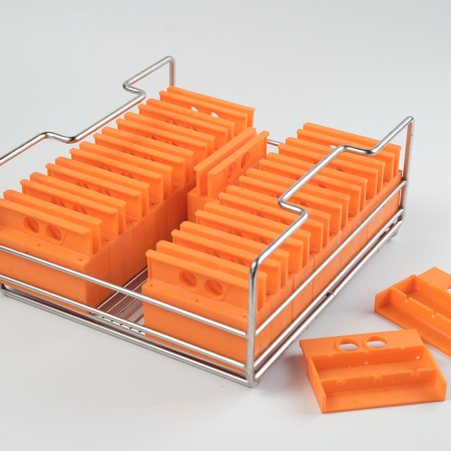 A tray of silicone molds to make Collins spear clear ice blocks.