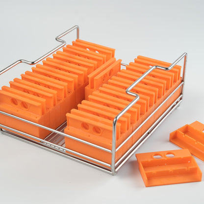 A tray of silicone molds to make Collins spear clear ice blocks.