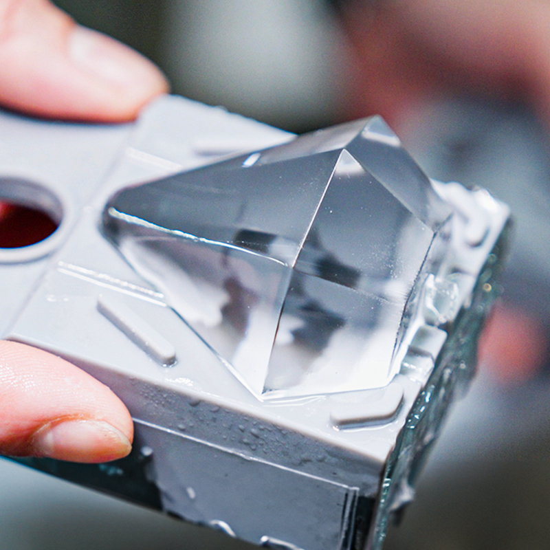 A clear ice block of diamond shape