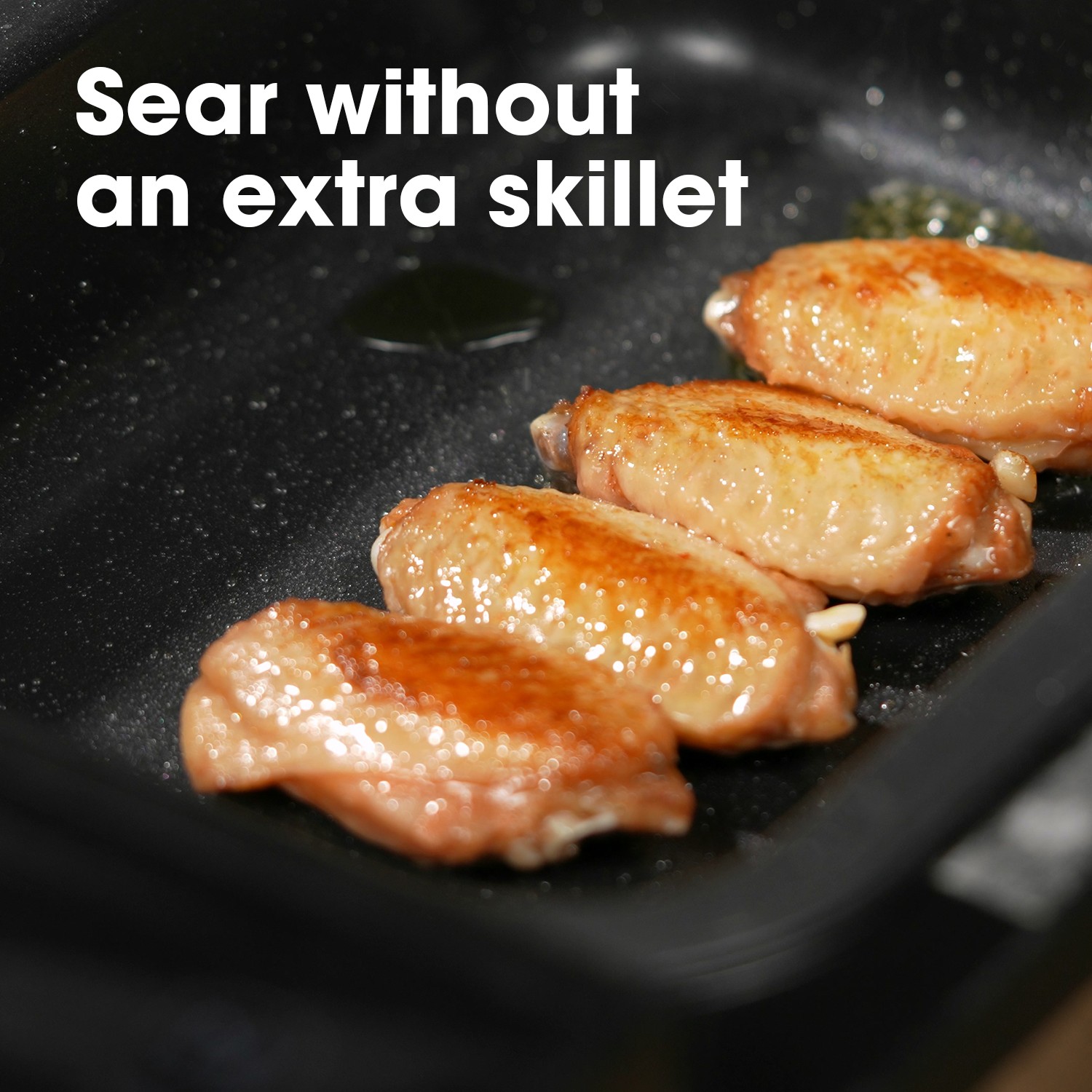Chicken wings being seared in Neovide sous vide cooker with text 'Sear without an extra skillet'.