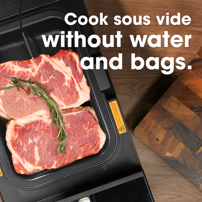 Raw meat with rosemary in a sous vide machine on a wooden surface.