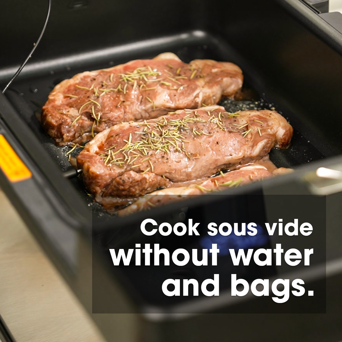 Two pieces of seasoned meat cooking in a sous vide machine with text overlay.