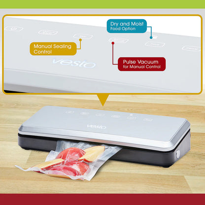 Vesta vacuum sealer on a wooden surface with food being vacuum sealed.